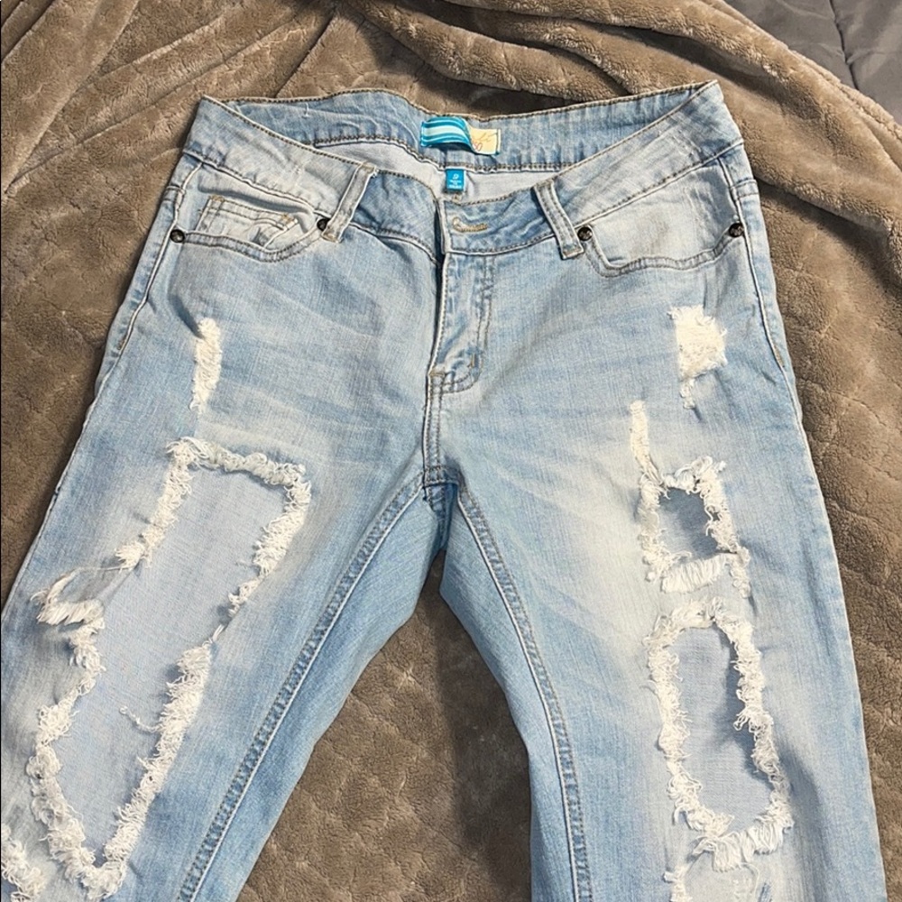 New super distressed jeans